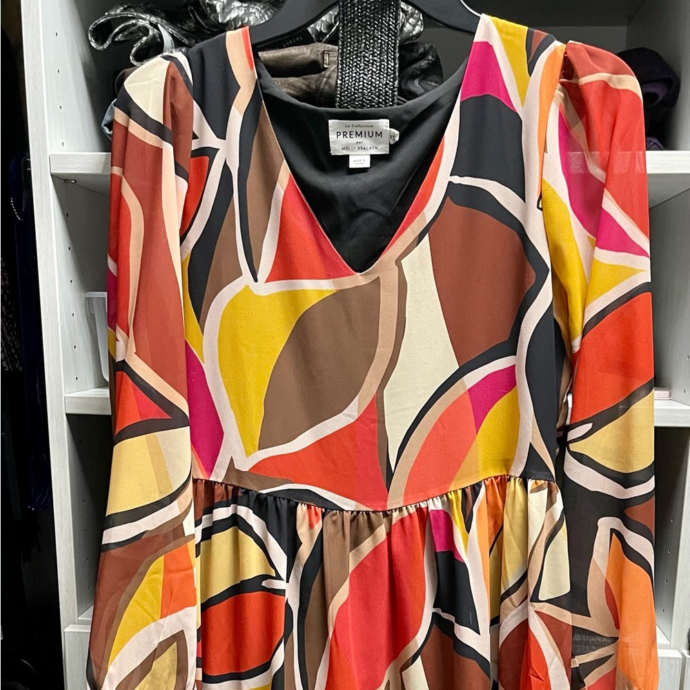 Premium dress by Molly Bracken size extra small multi fall colors. Worn ones.
